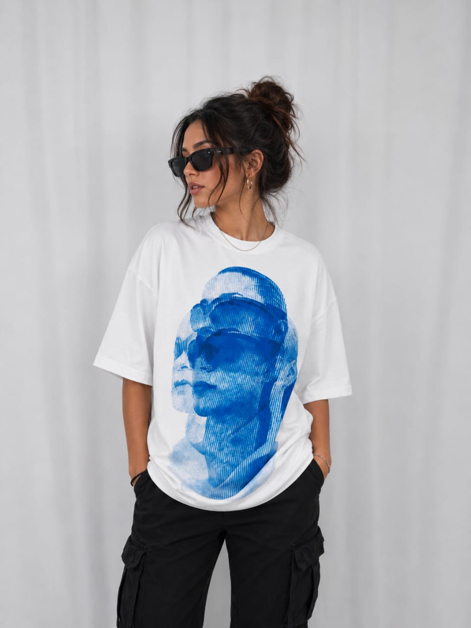 “Blue Phantom Oversized Tee”.