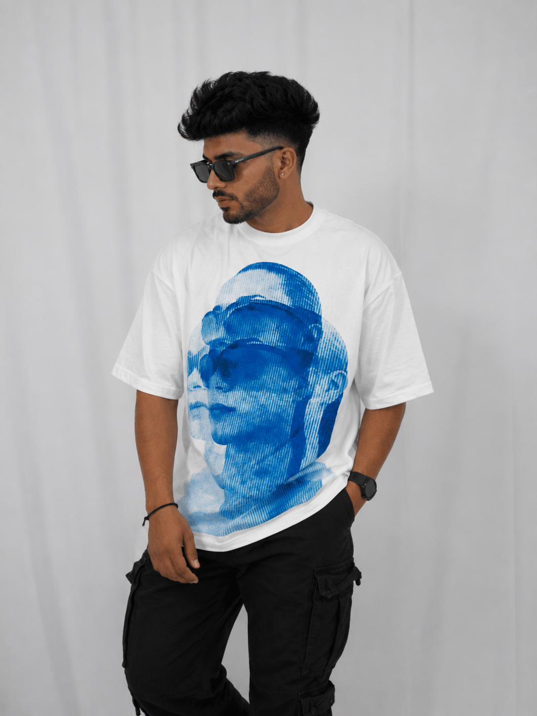 “Blue Phantom Oversized Tee”.